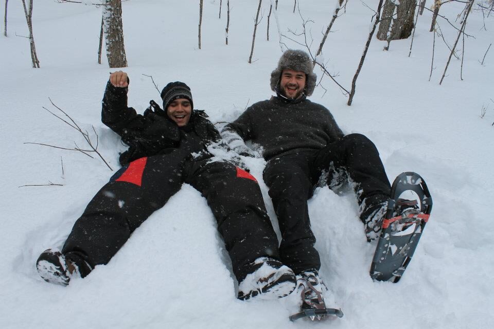 2 people in snow with snow shoes