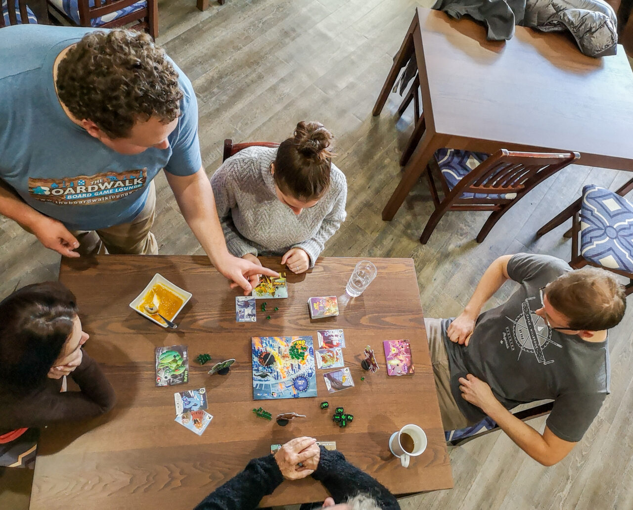 people playing a board game