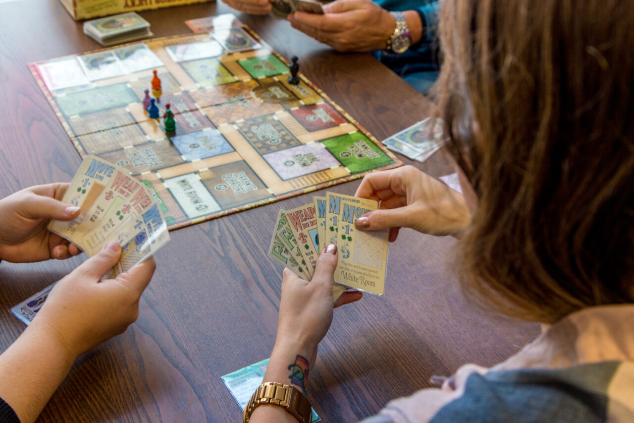 group of people playing a board game