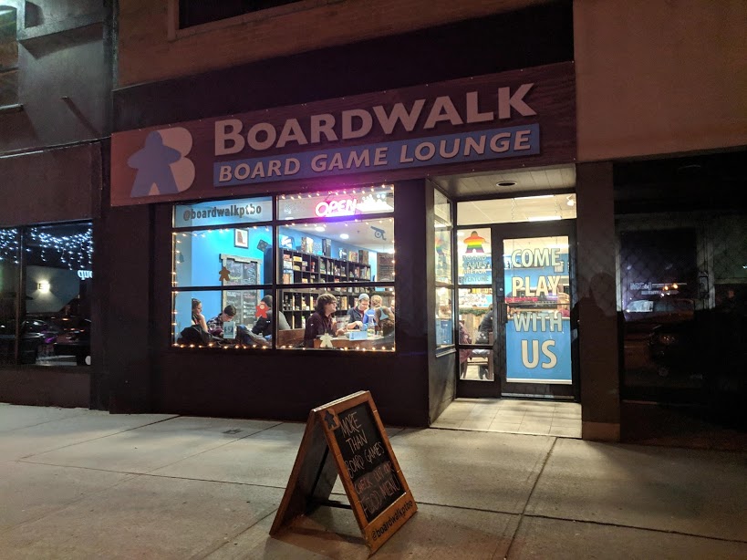 exterior of the boardwalk game lounge at night