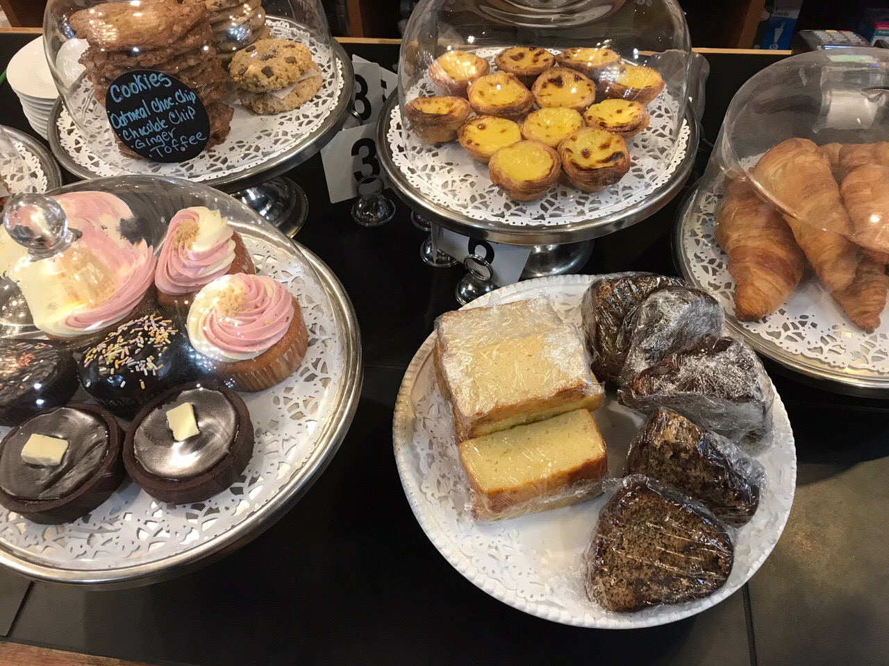 A table displaying a selection of baked goods