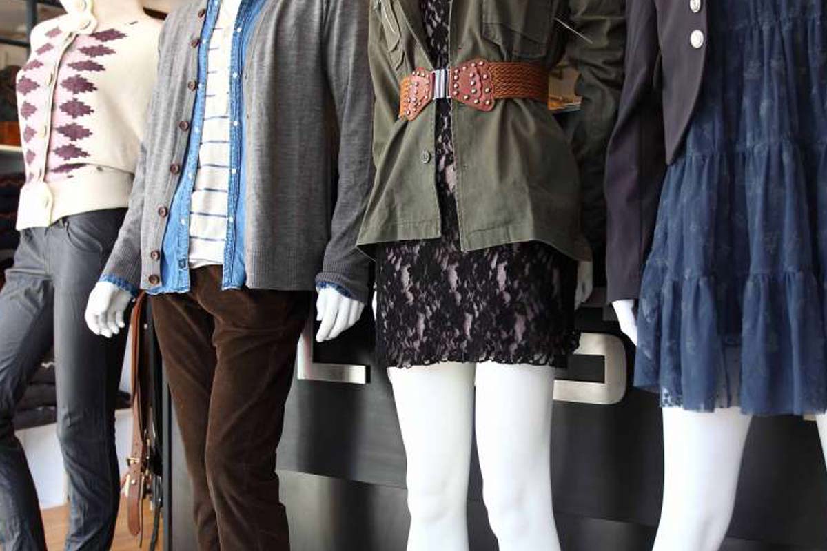 4 mannequins on display with nice clothes