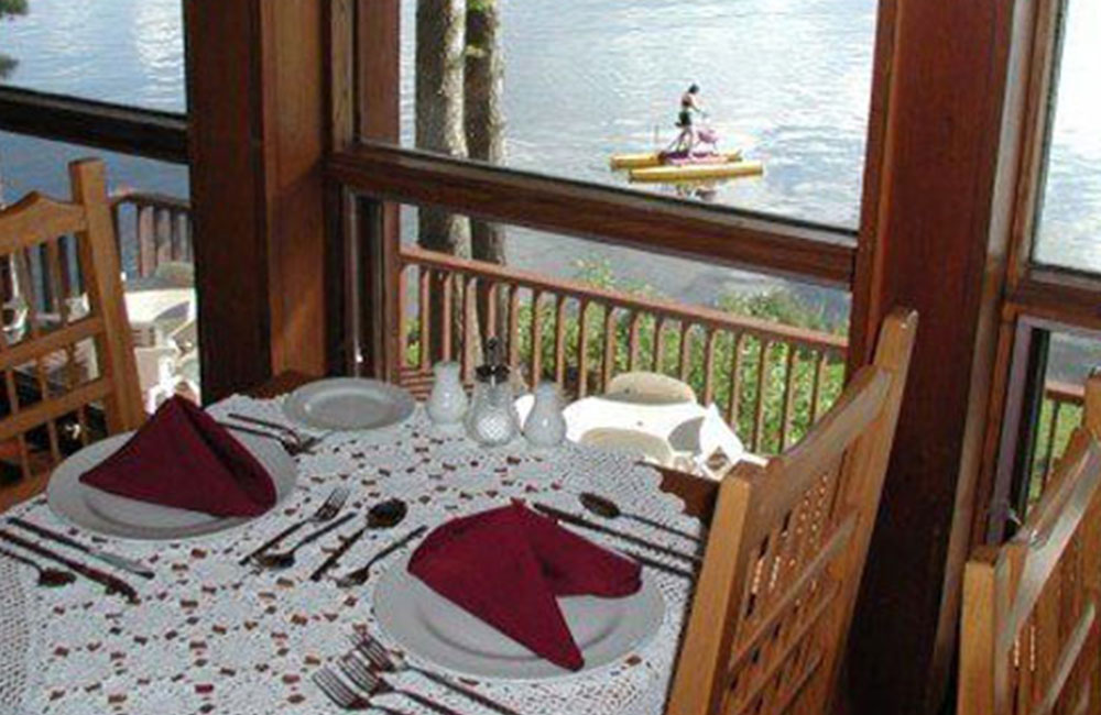 table on patio overlooking the lake