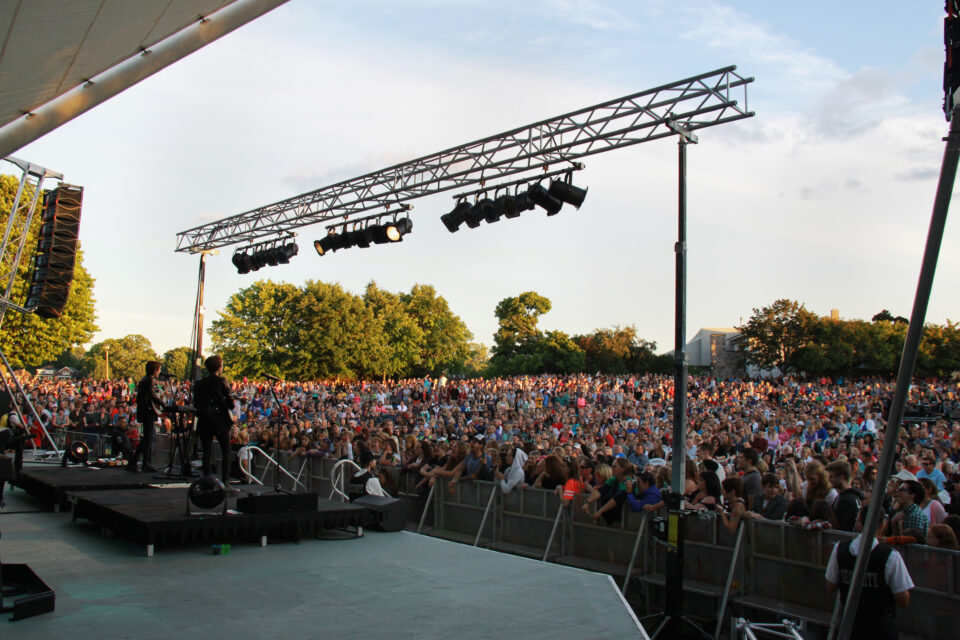 a crowd around a stage