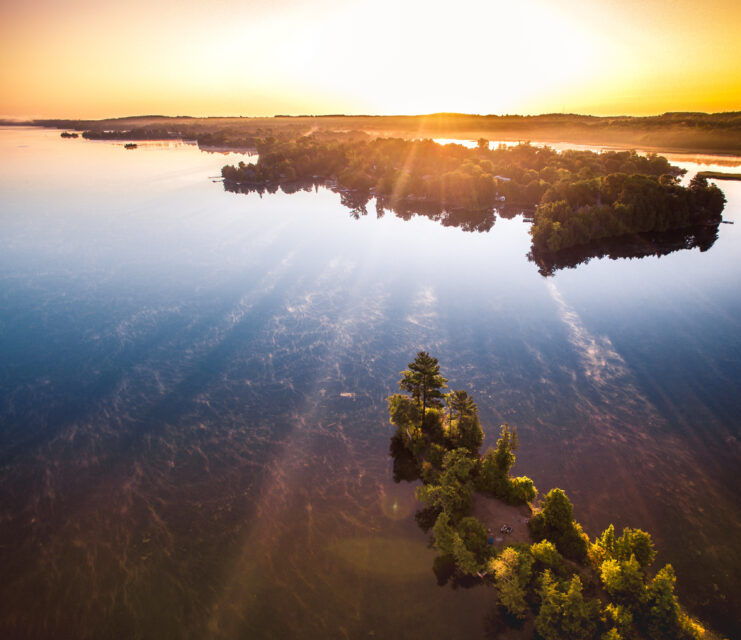 a sunrise on a lake