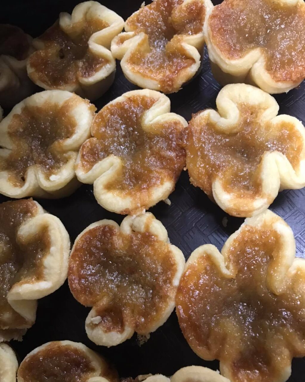 a tray of butter tarts
