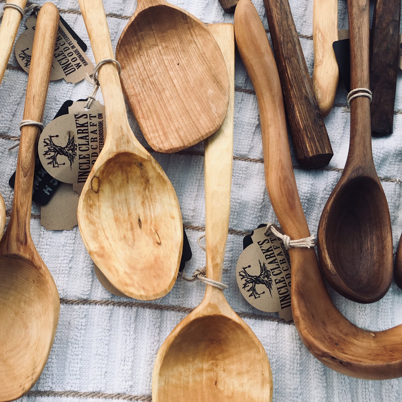 a bunch of wooden spoons
