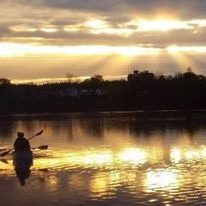 kayak at sunrise or sunset