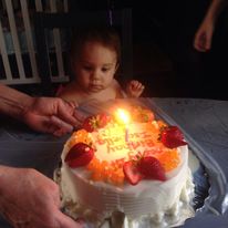 birthday cake and a baby