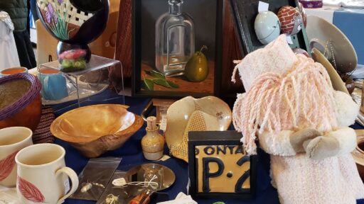 Hand crafted gifts and objects displayed on a table