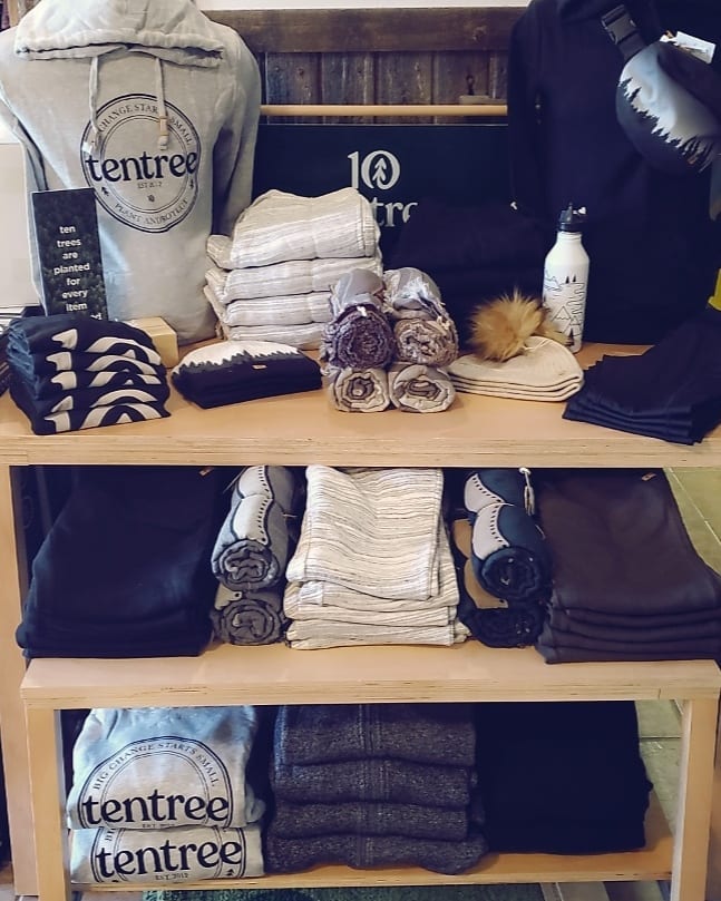 display of tentree-branded clothing and merchandise