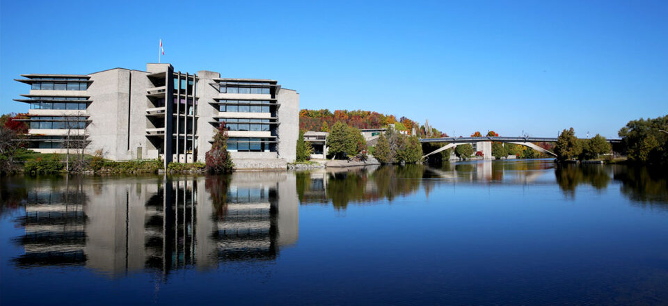 a building at Trent University on the water