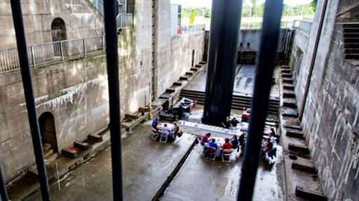 people dine in a large lift lock