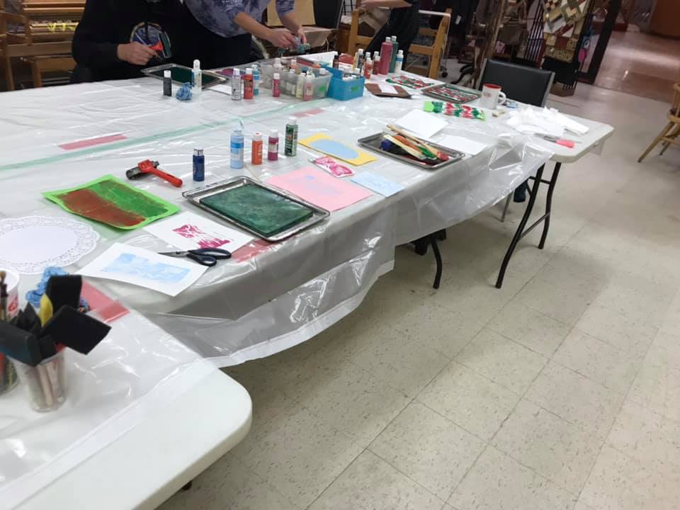 Craft table with paint supplies