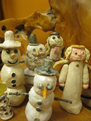pottery snowmen crafted by children