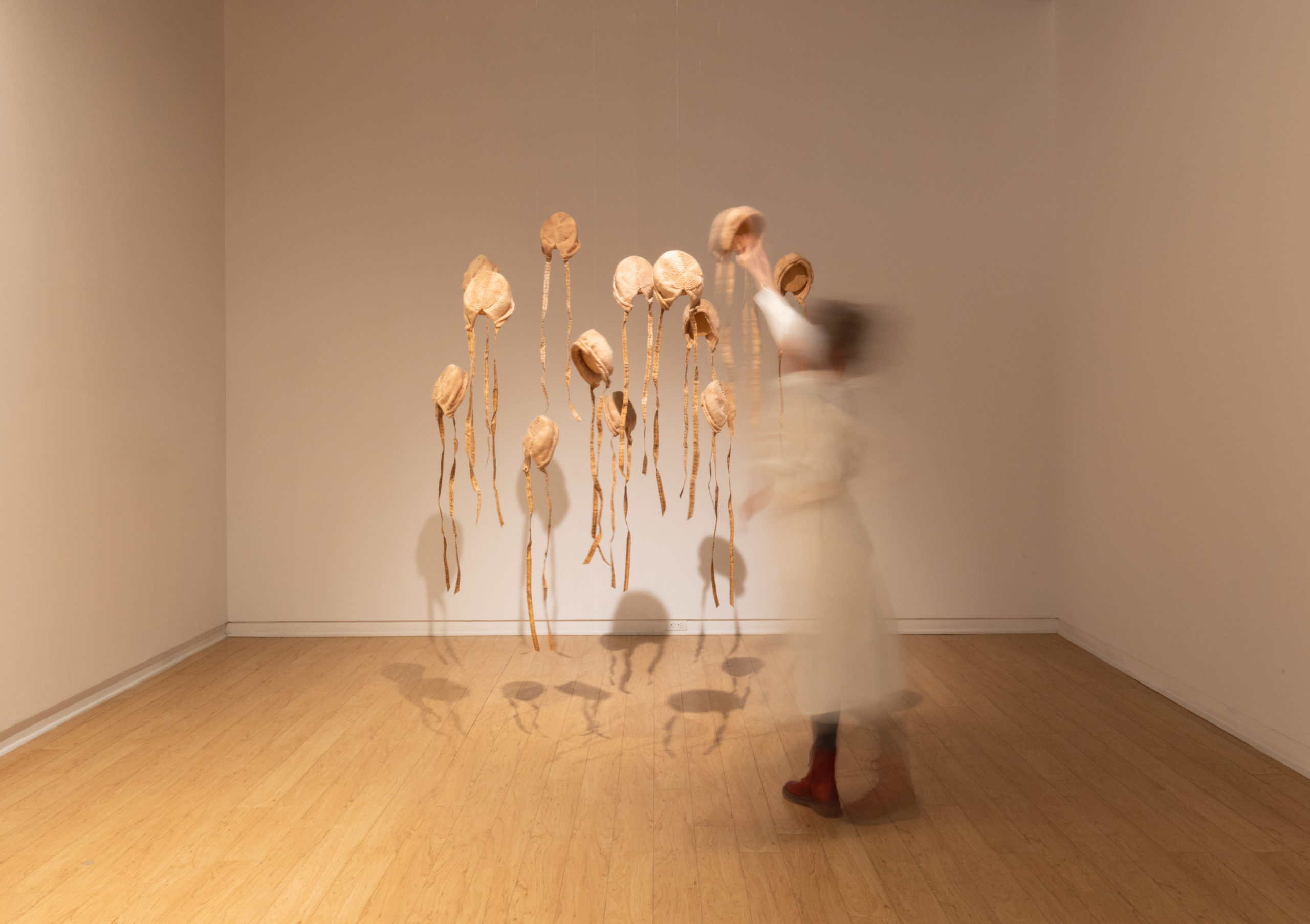 a person interacts with an art installation