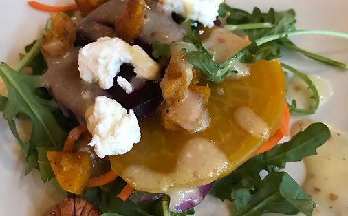 gourmet salad with goat cheese and arugula 