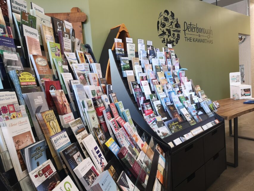 Travel brochures on display at the Peterborough & the Kawarthas Visitor Centre