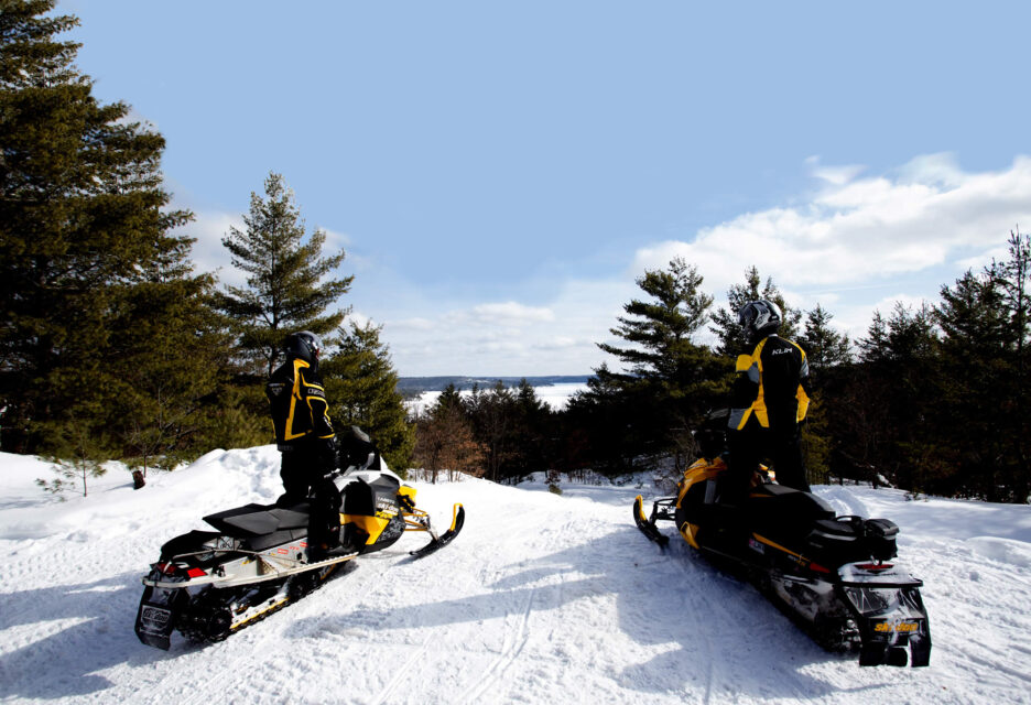 Two snowmobilers
