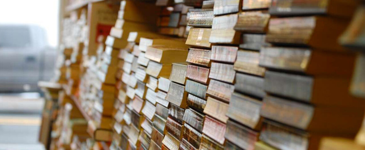 a close up of a stack of books