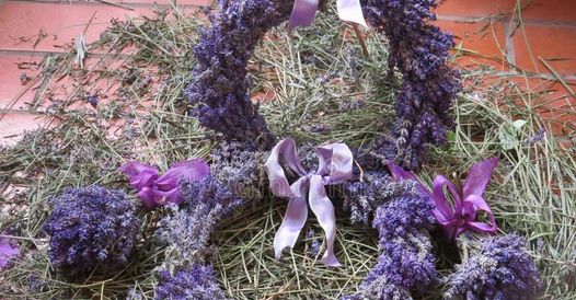 hand crafted lavender wreath with purple ribbon
