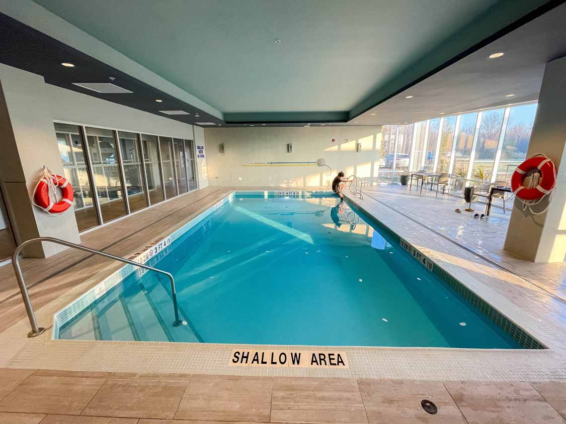 A person in a a swimming pool at Hampton Inn Peterborough