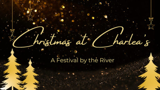 Christmas at Charlea's, a festival by the river. gold christmas trees on both sides of writing