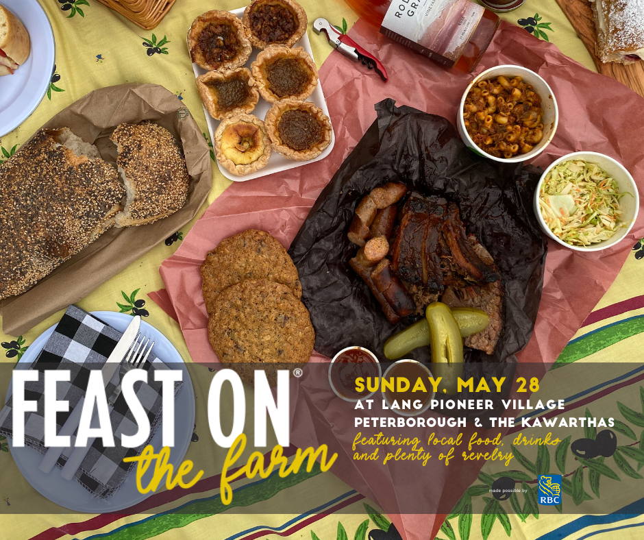 a table with plates of different foods, with the words Feast on the Farm written across