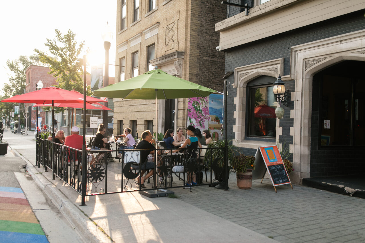 La Hacienda Patio full in the summer sunshine.