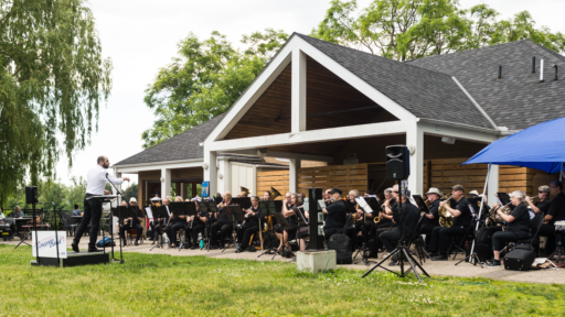 a concert band in front of a building