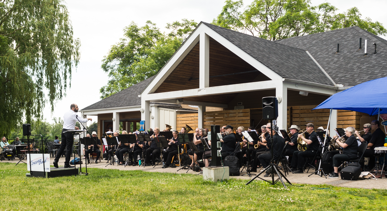 a concert band in front of a building