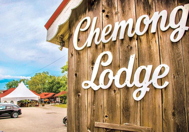 chemong lodge sign with texts in background