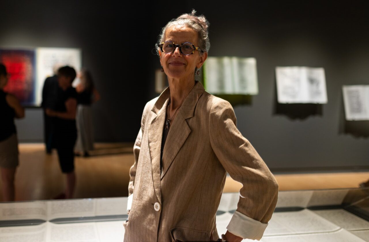 Alice Teichert with background of an art gallery