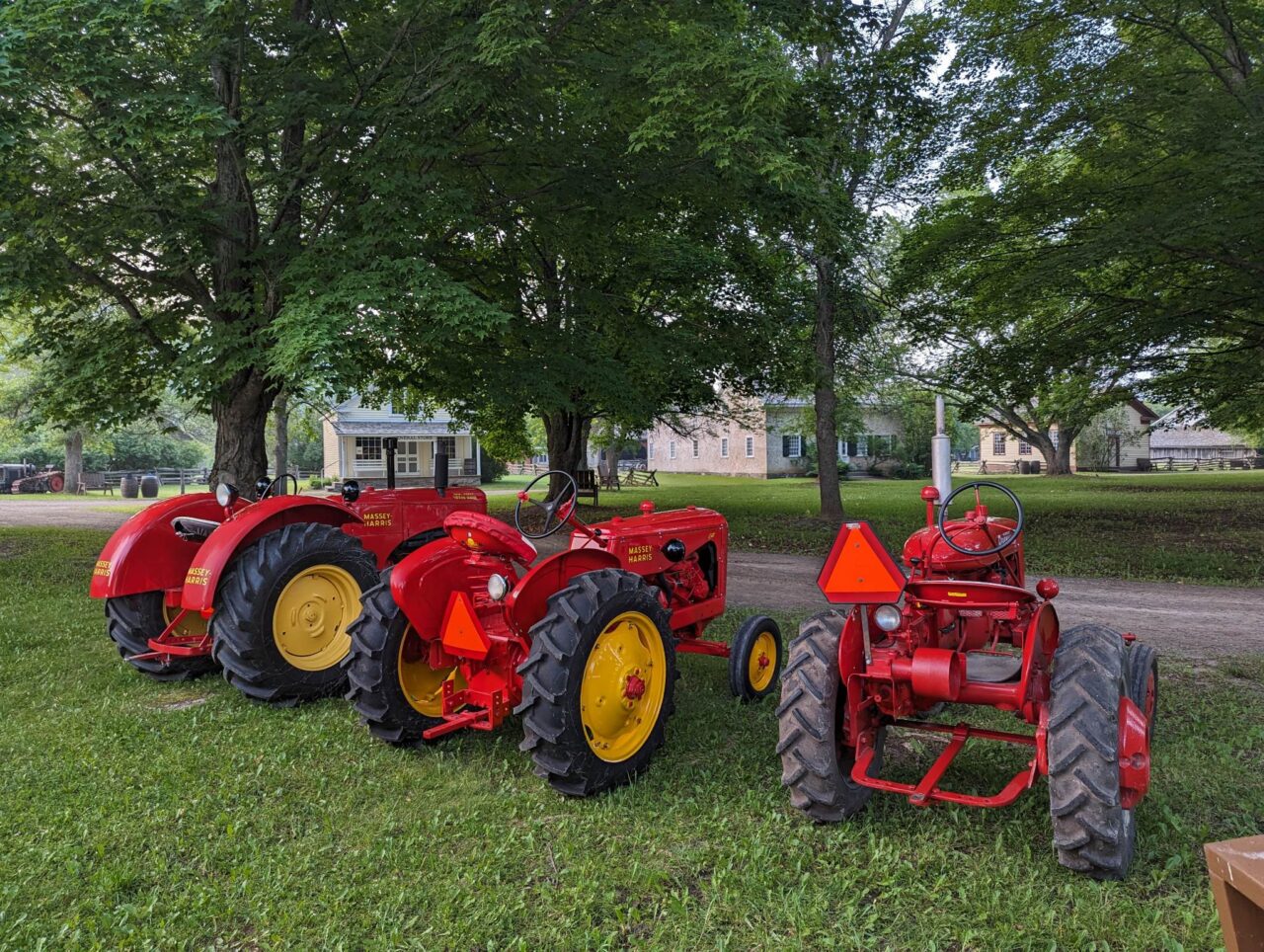 three red tractors