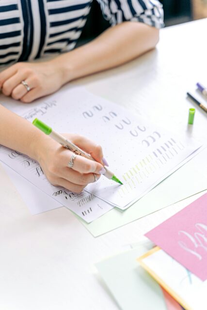 a person practicing doing letters