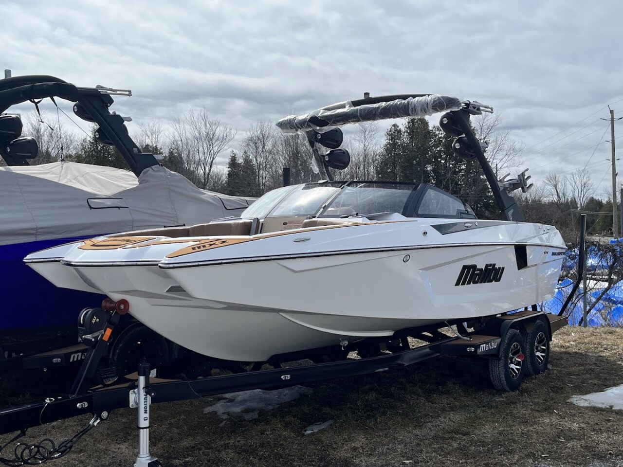 Wakeboarding boat out of water