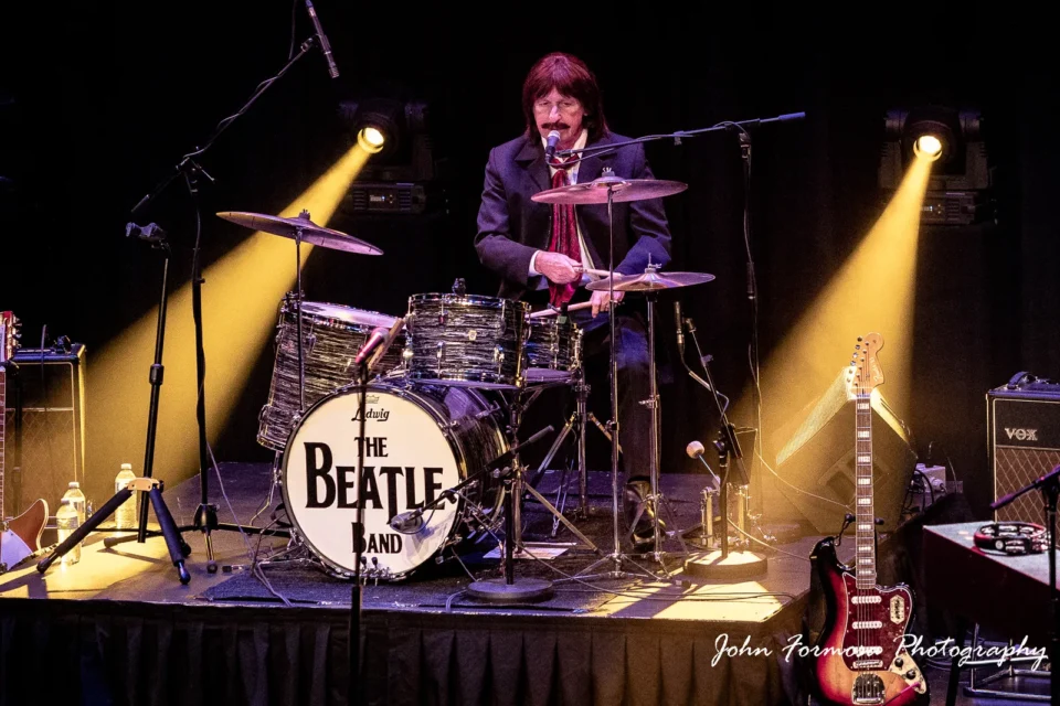 man playing drums