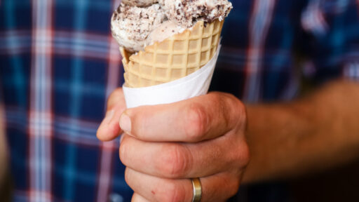 hand holding an ice cream cone
