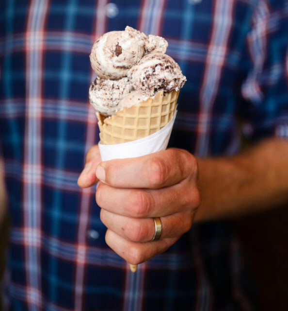 hand holding an ice cream cone